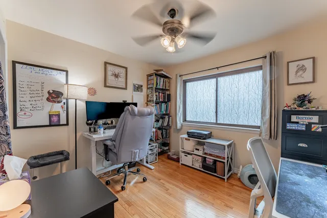 a workspace with furniture and window