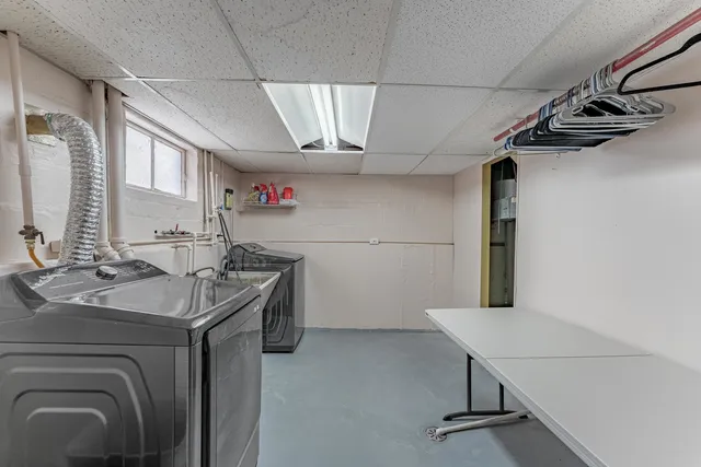 a utility room with cabinets