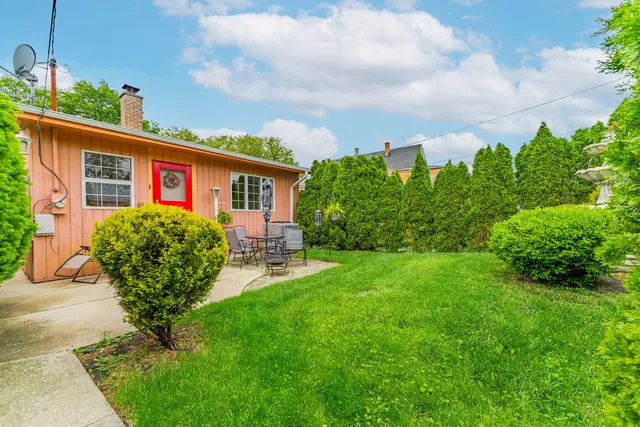 a house view with a garden space