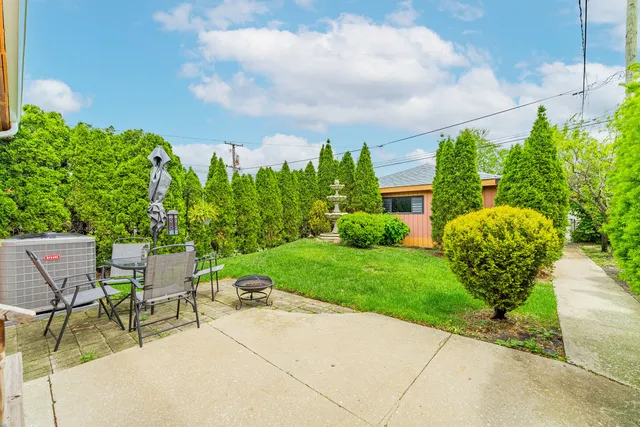 a garden view with a seating space