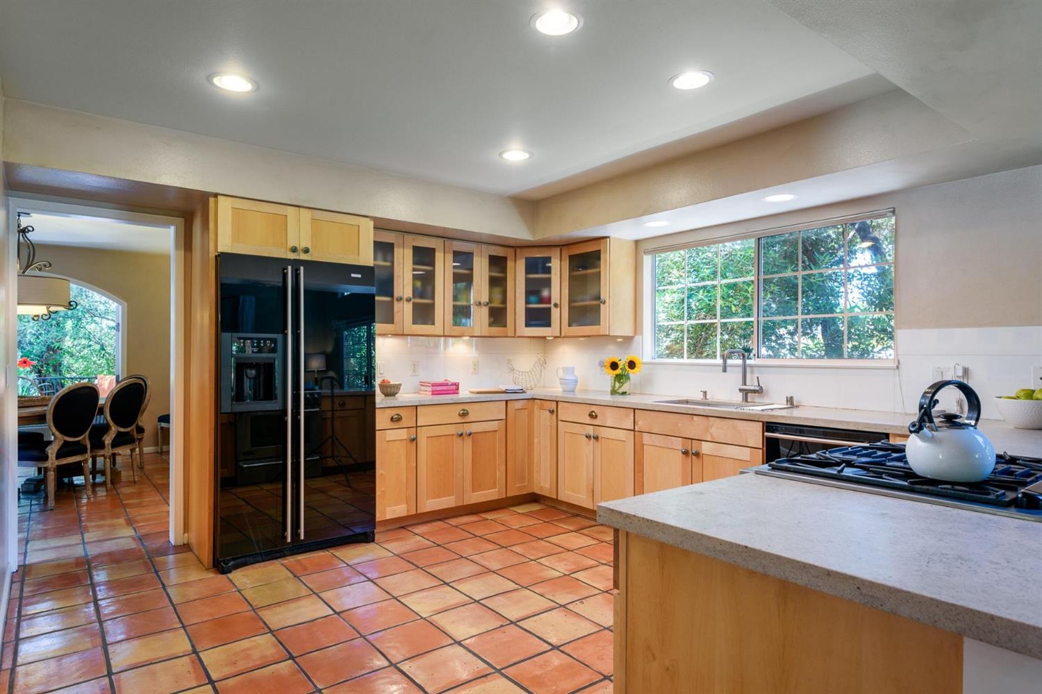 1201 Rains Court Ojai, CA 93023 - Photo 13 of 38 a kitchen with stainless steel appliances granite countertop a refrigerator and a sink