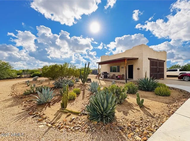 a view of a house with a patio