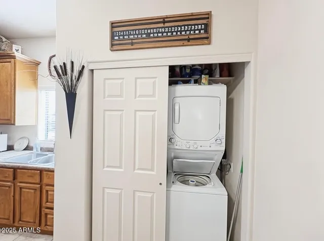 a shelf with books and knick knacks on it
