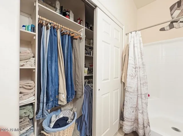 a view of a house with backyard and swimming pool