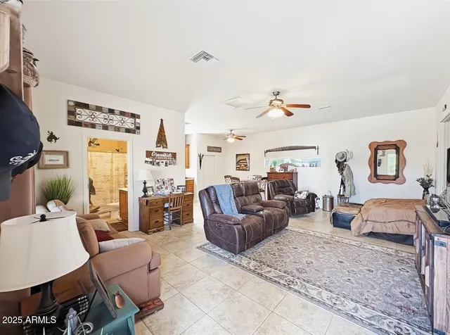 a living room with furniture and a couch