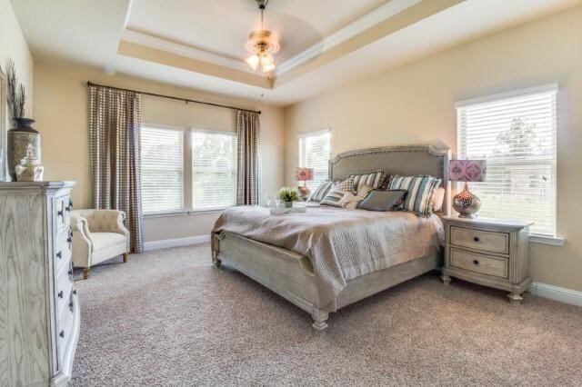 400 Lilly Bell Lane, Unit LOT 26 Freeport, FL 32439 - Photo 19 of 43 a bedroom with a bed and a couch