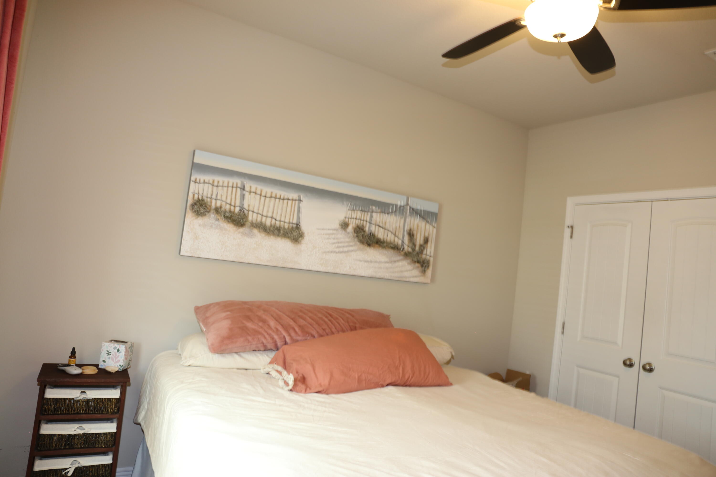 400 Lilly Bell Lane, Unit LOT 26 Freeport, FL 32439 - Photo 27 of 43 a bedroom with a bed and cabinets