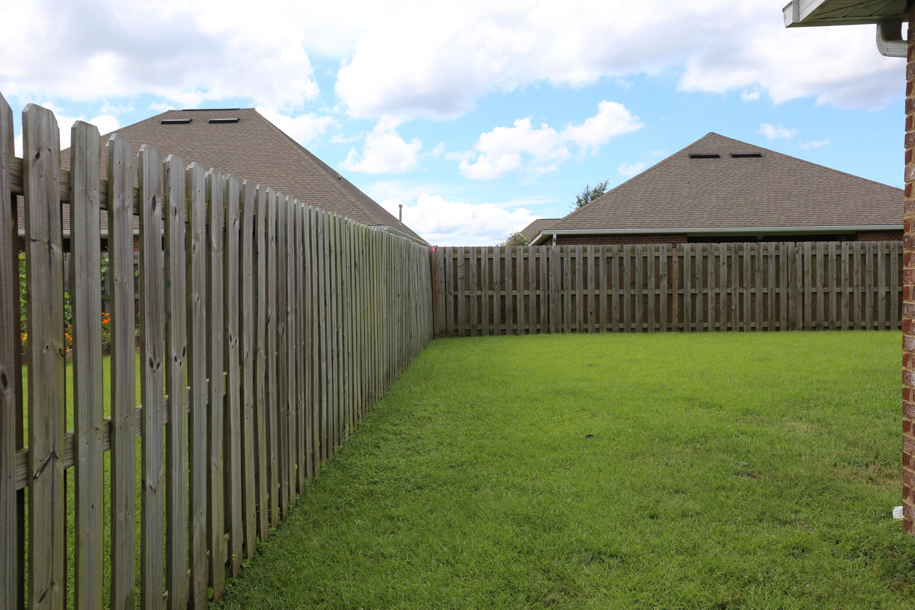 400 Lilly Bell Lane, Unit LOT 26 Freeport, FL 32439 - Photo 32 of 43 a view of a backyard with a garden