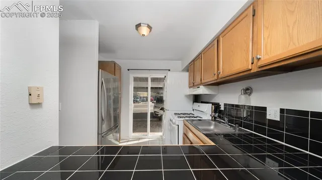 a room with a black white checkered floor