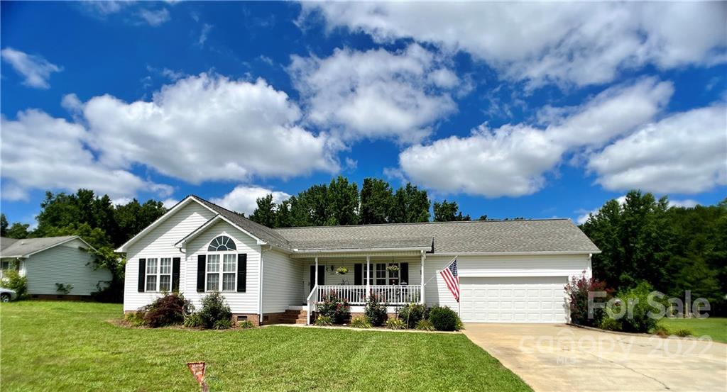 2325 Sides Road Rockwell, NC 28138 - Photo 2 of 14 a front view of a house with garden