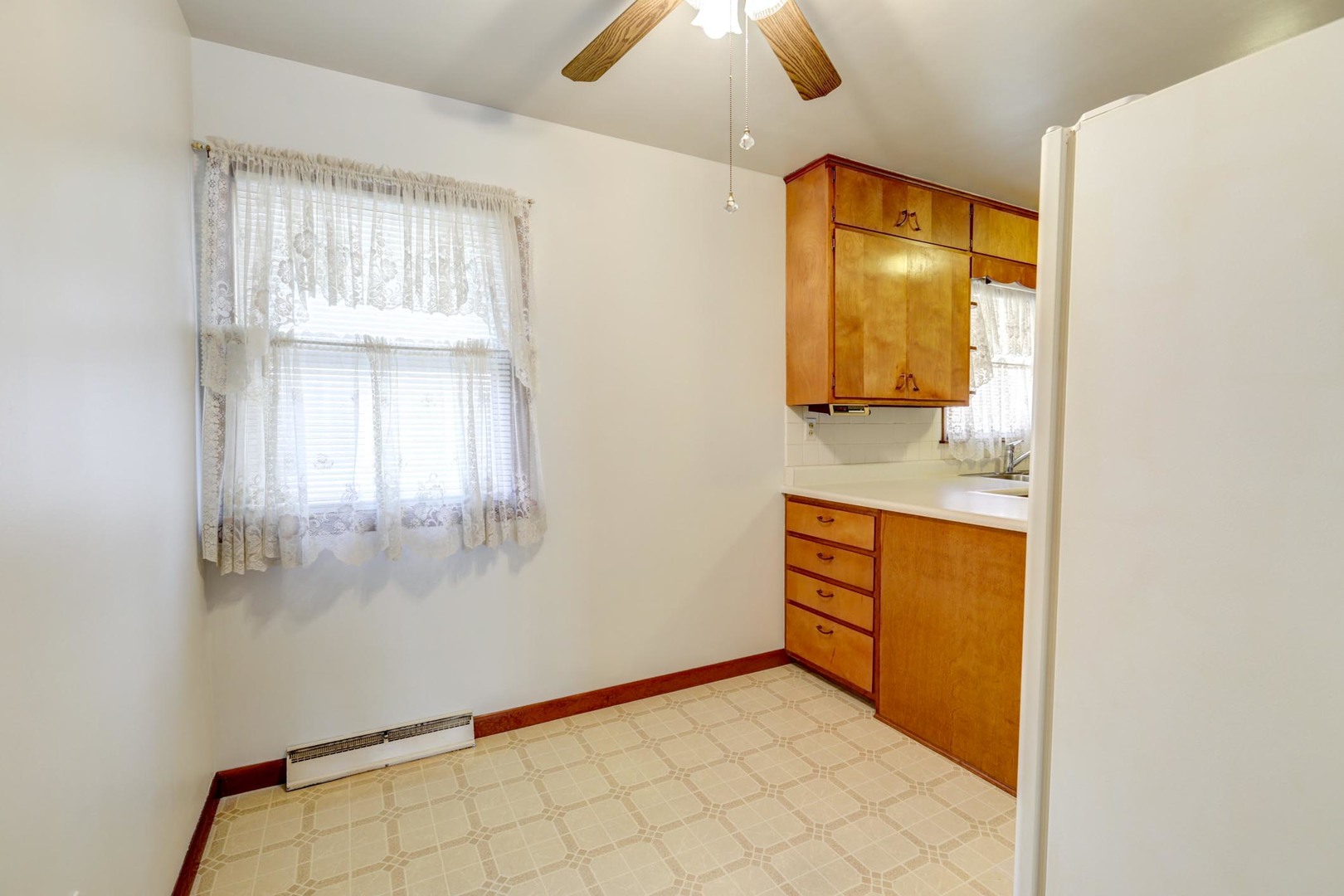 135 Ottawa Road Paxton, IL 60957 - Photo 9 of 21 a bathroom with a sink and a mirror