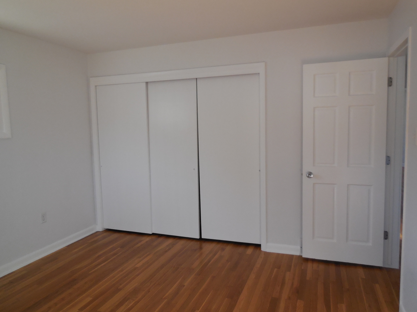1220 Robin Road Dixon, IL 61021 - Photo 10 of 18 a view of an empty room with wooden floor