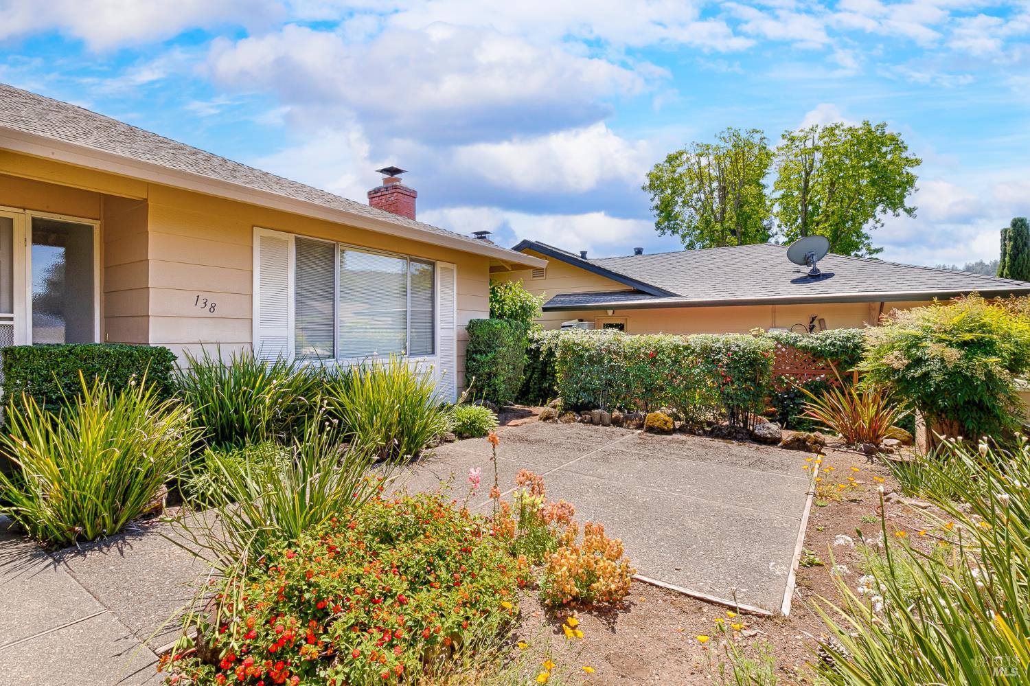 138 Oak Shadow Drive Santa Rosa, CA 95409 - Photo 6 of 50 a front view of a house with a yard