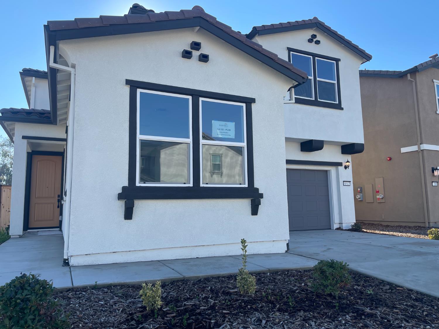 8512 Cottonseed Way Elk Grove, CA 95624 - Photo 2 of 9 a view of a house with a yard