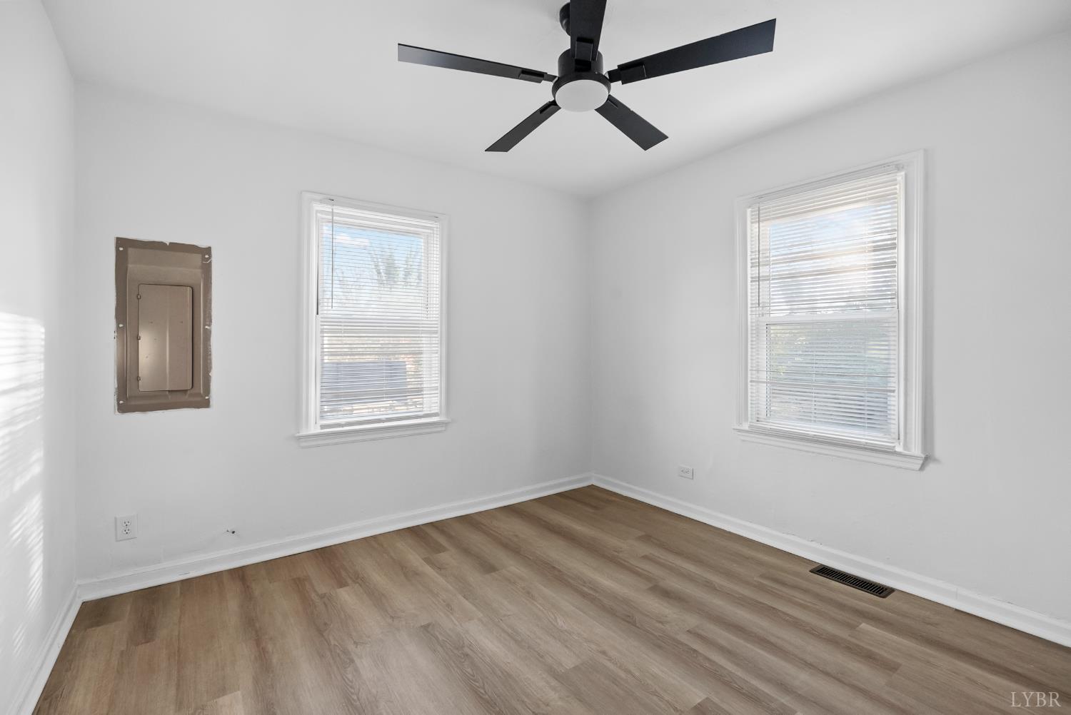 1201 Brandon Road Lynchburg, VA 24502 - Photo 11 of 25 a view of empty room with wooden floor and fan