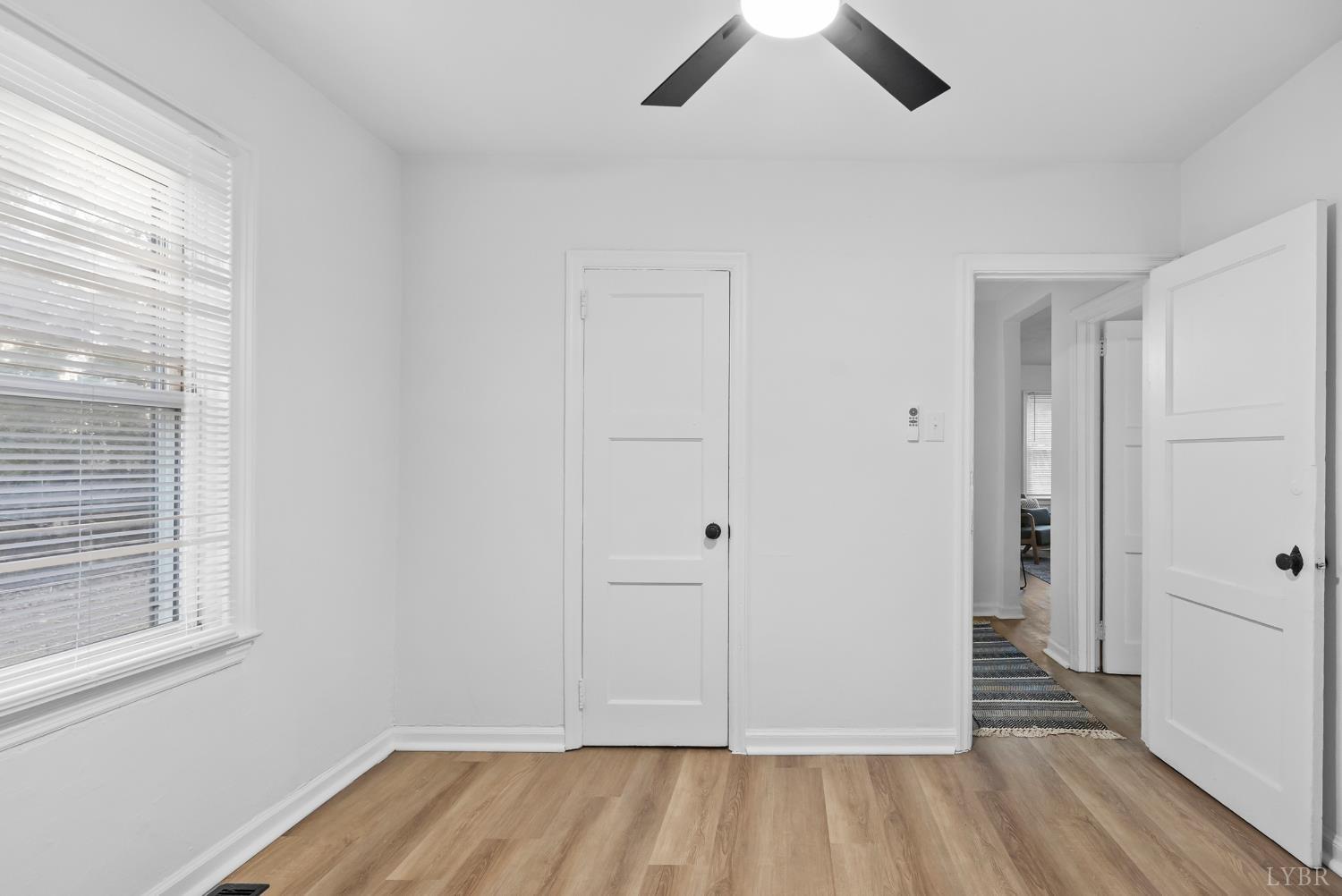 1201 Brandon Road Lynchburg, VA 24502 - Photo 13 of 25 wooden floor in an empty room with a window