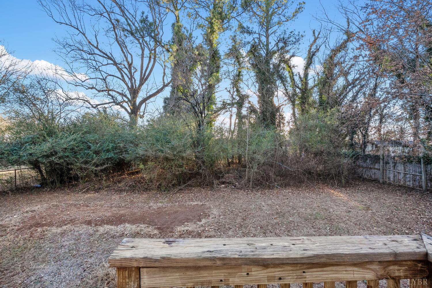 1201 Brandon Road Lynchburg, VA 24502 - Photo 20 of 25 a view of a dry yard with trees
