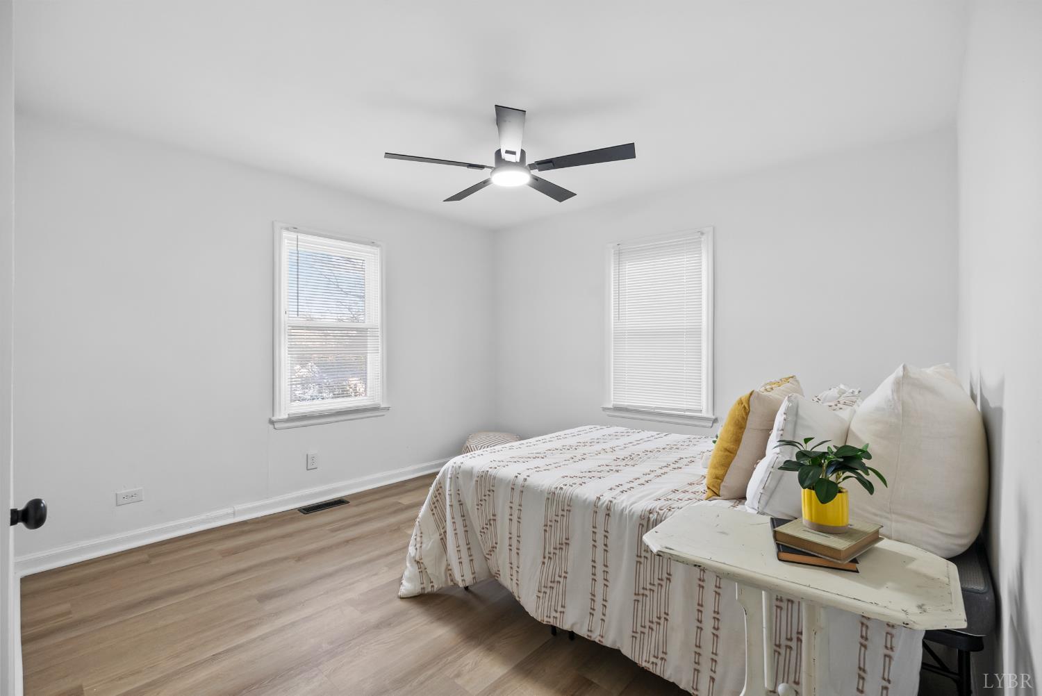 1201 Brandon Road Lynchburg, VA 24502 - Photo 9 of 25 a bedroom with a bed and wooden floor