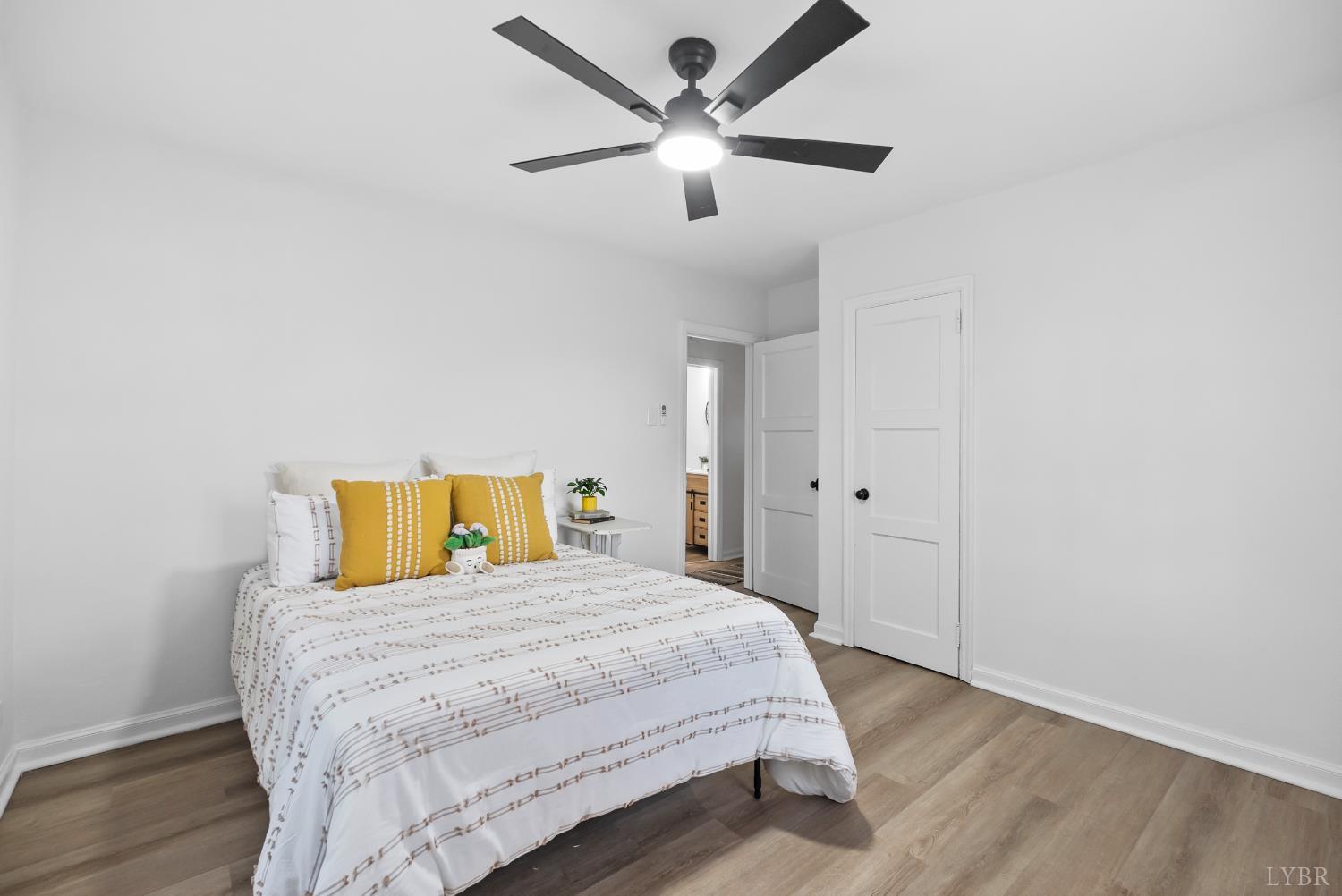 1201 Brandon Road Lynchburg, VA 24502 - Photo 10 of 25 a bedroom with a bed and a ceiling fan