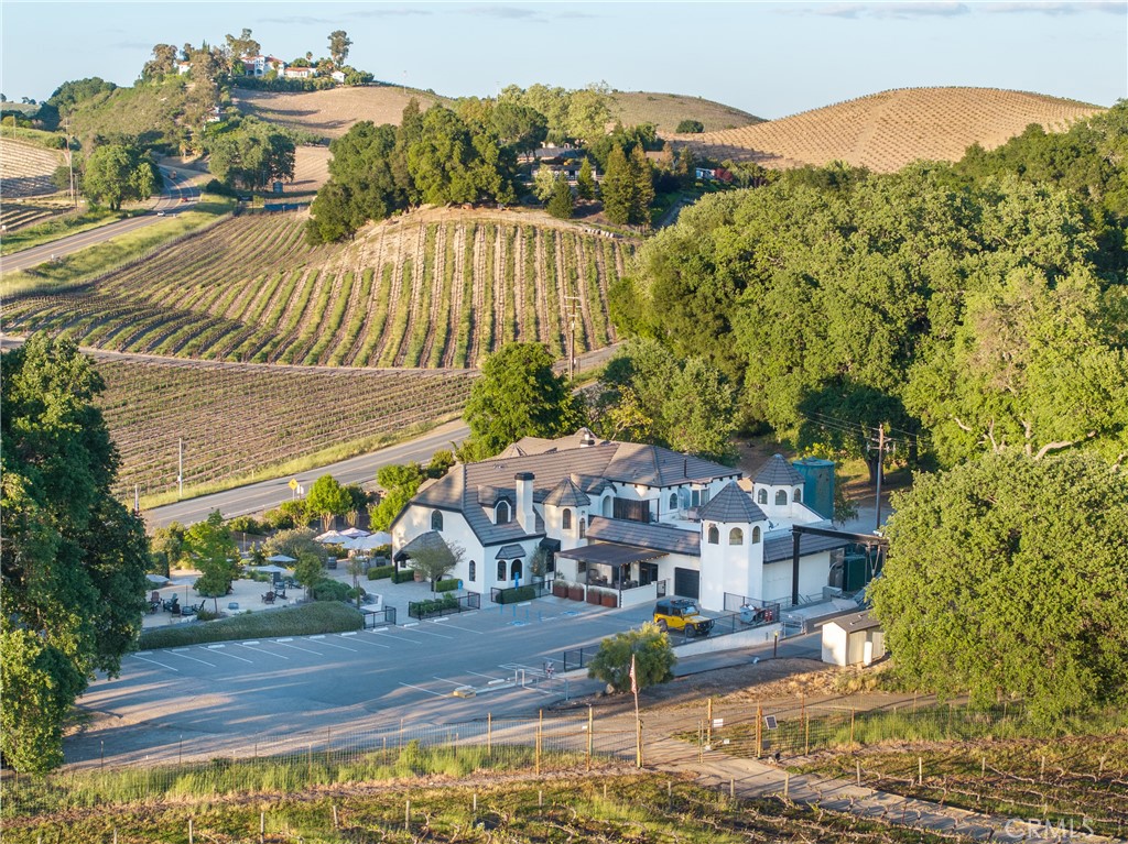 a view of a town with mountains front of house