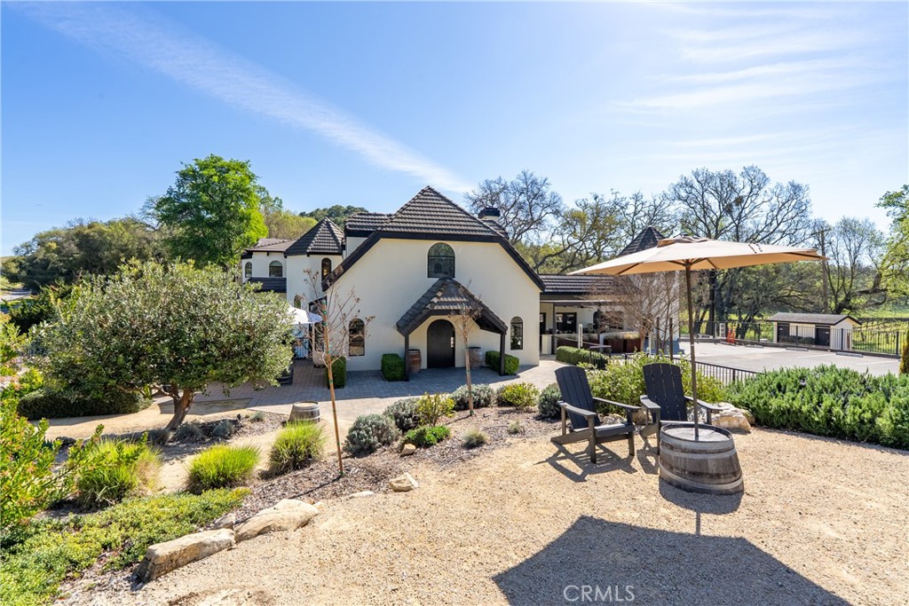 2720 Oak View Road Templeton, CA 93465 - Photo 17 of 64 a view of a house with a tub and a garden