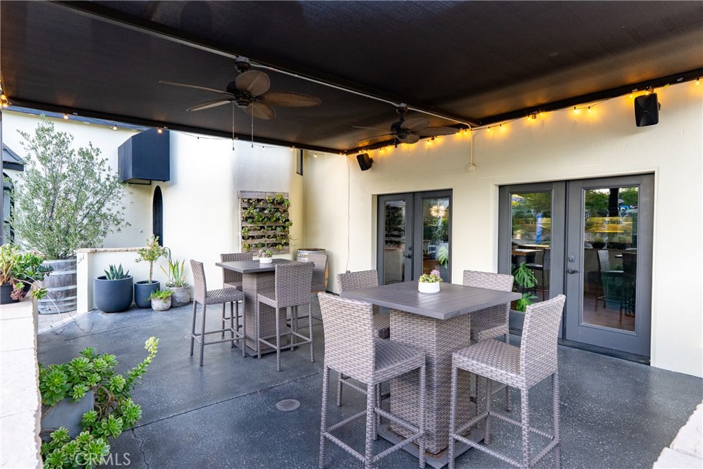 2720 Oak View Road Templeton, CA 93465 - Photo 23 of 64 a view of a patio with table and chairs and potted plants