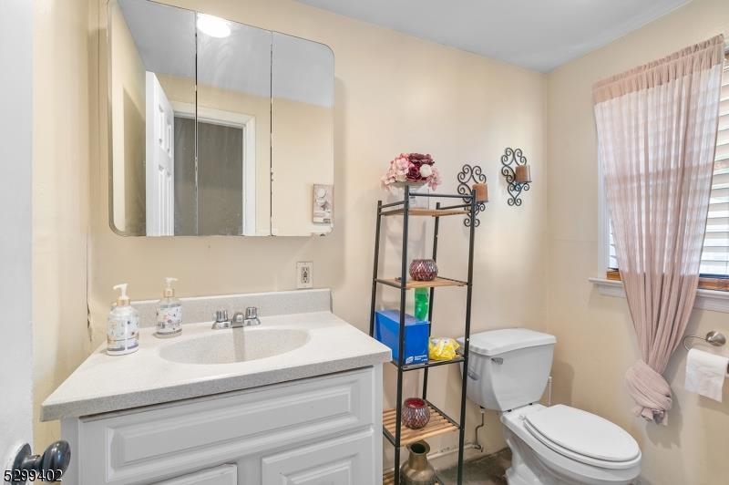 27 Donaldson Avenue Rutherford, NJ 07070 - Photo 16 of 19 a bathroom with a sink toilet and shower