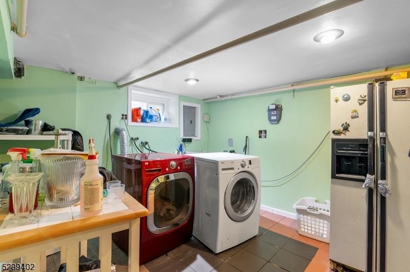 27 Donaldson Avenue Rutherford, NJ 07070 - Photo 18 of 19 a utility room with dryer and washer