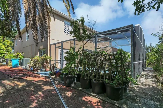 a backyard of a house with lots of green space