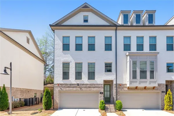 a front view of a building with street view