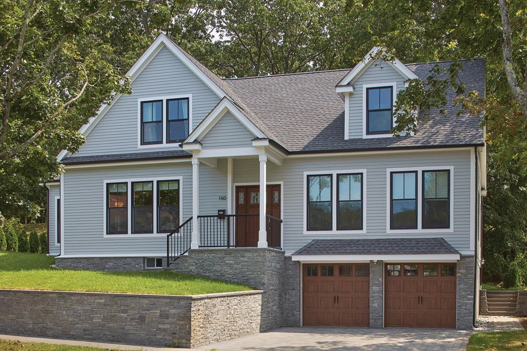 160 Bellingham Road Brookline, MA 02467 - Photo 1 of 7 a front view of a house with a yard
