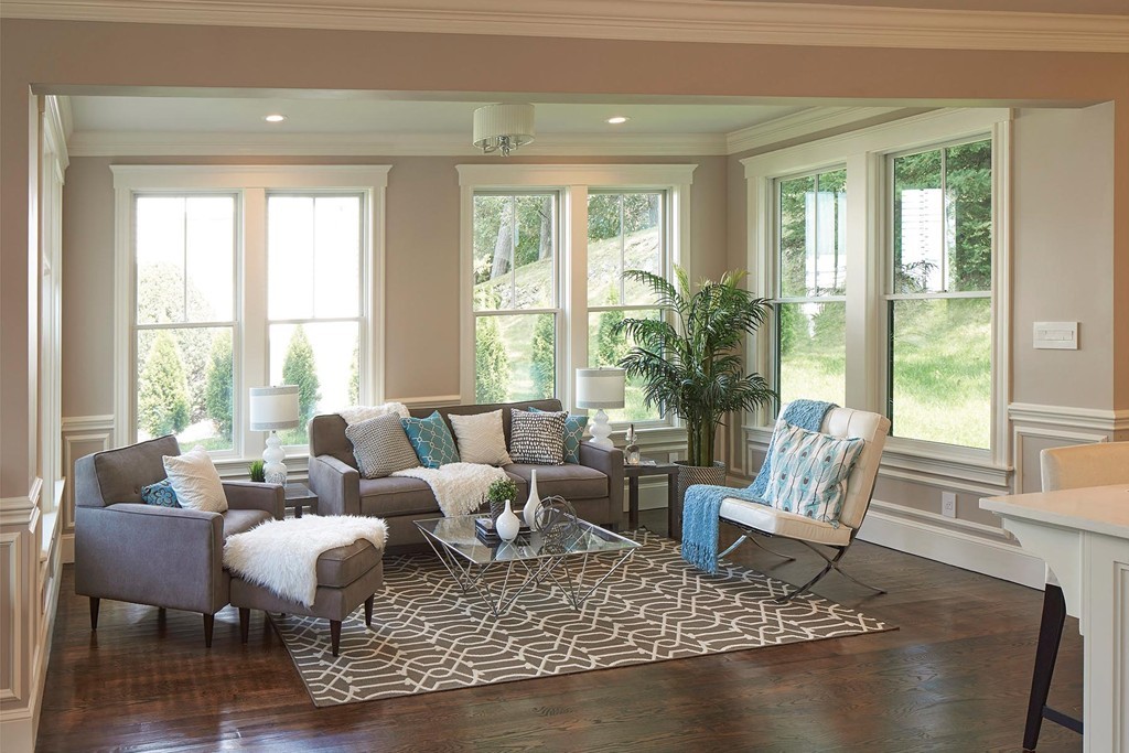 160 Bellingham Road Brookline, MA 02467 - Photo 2 of 7 a living room with furniture and a large window