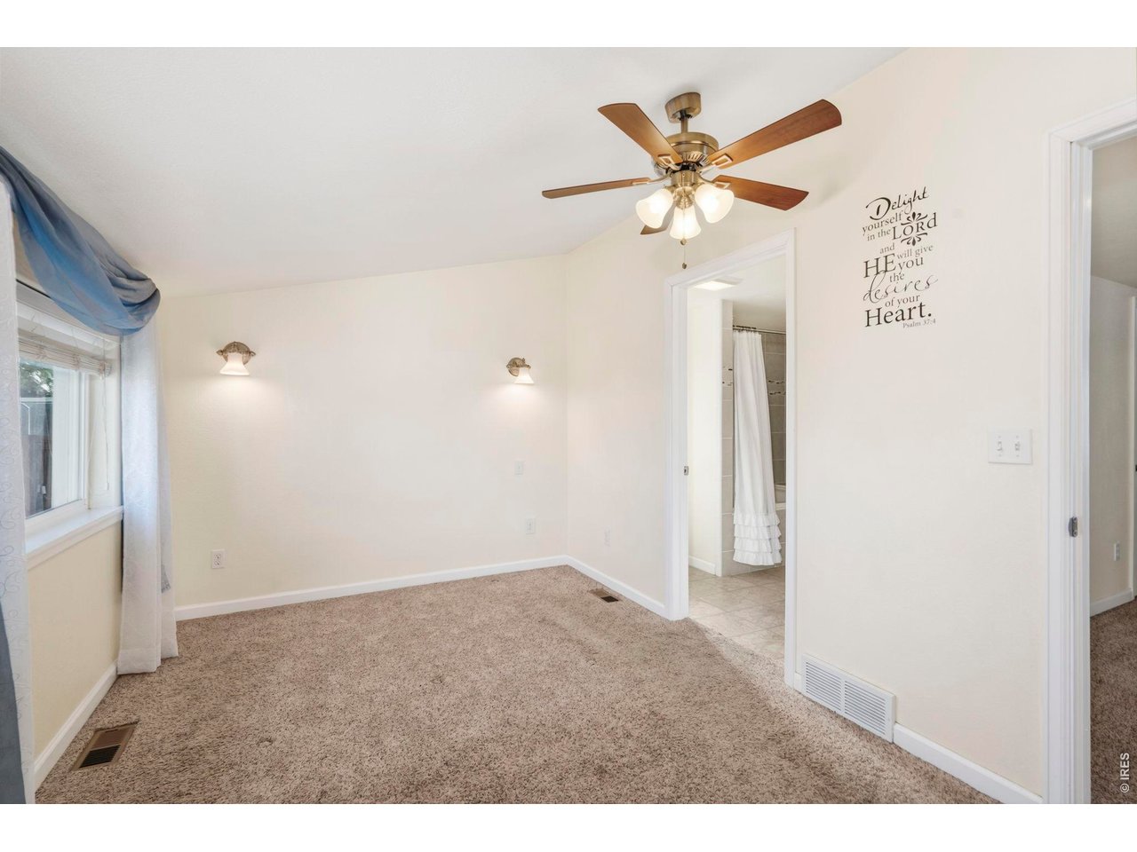1083 2nd Street Nunn, CO 80648 - Photo 15 of 50 a view of a livingroom with a ceiling fan