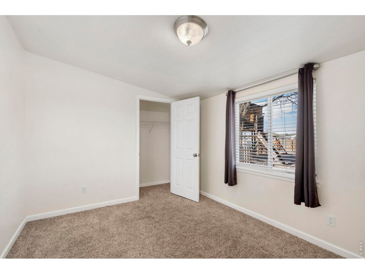1083 2nd Street Nunn, CO 80648 - Photo 18 of 50 a hall with an outdoor space
