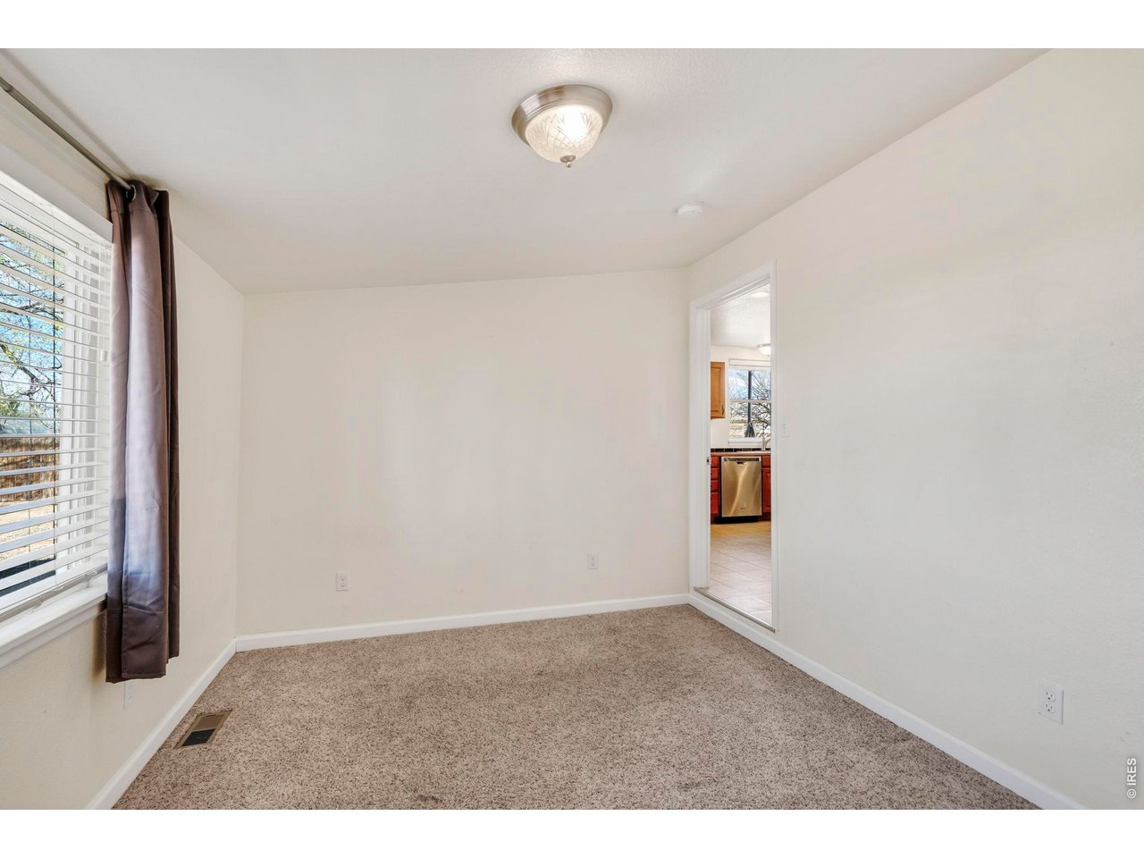 1083 2nd Street Nunn, CO 80648 - Photo 19 of 50 a view of an empty room and window