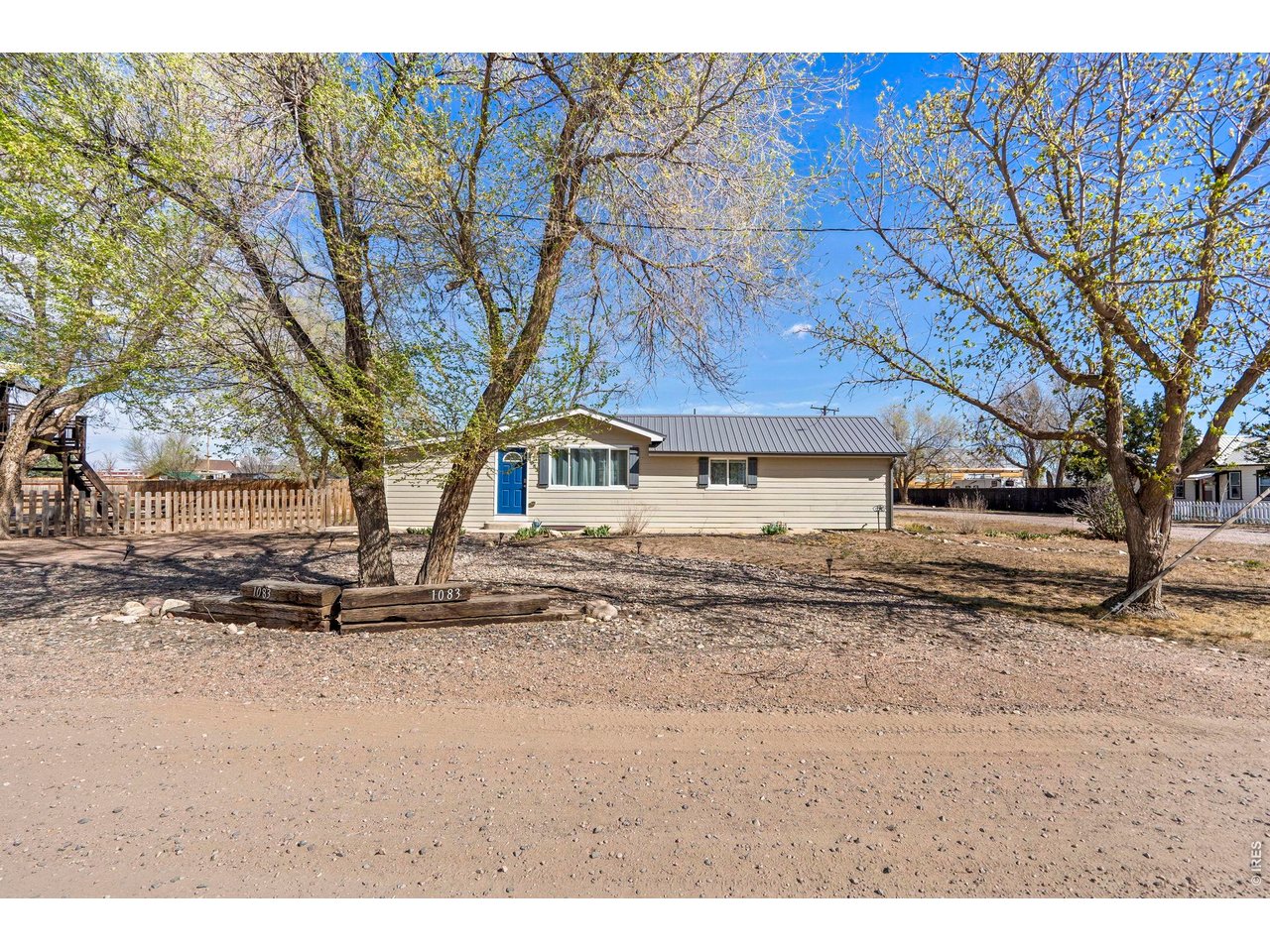 1083 2nd Street Nunn, CO 80648 - Photo 2 of 50 a view of a yard with a house