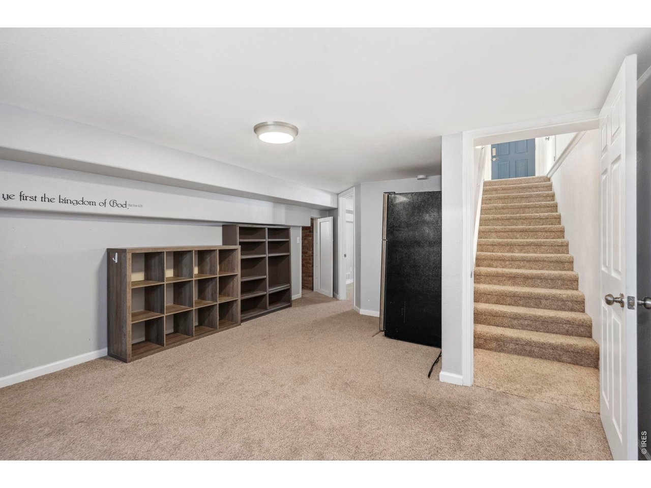 1083 2nd Street Nunn, CO 80648 - Photo 21 of 50 a view of an empty room with a cabinet and stairs