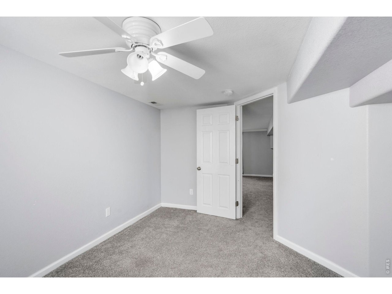 1083 2nd Street Nunn, CO 80648 - Photo 25 of 50 a view of an empty room with a window