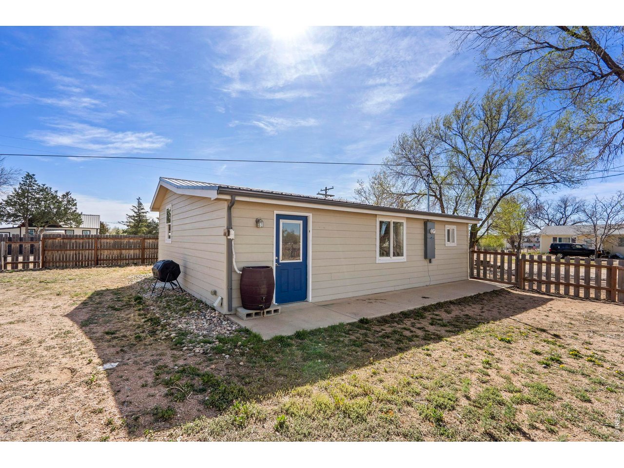 1083 2nd Street Nunn, CO 80648 - Photo 28 of 50 a view of a house with a yard