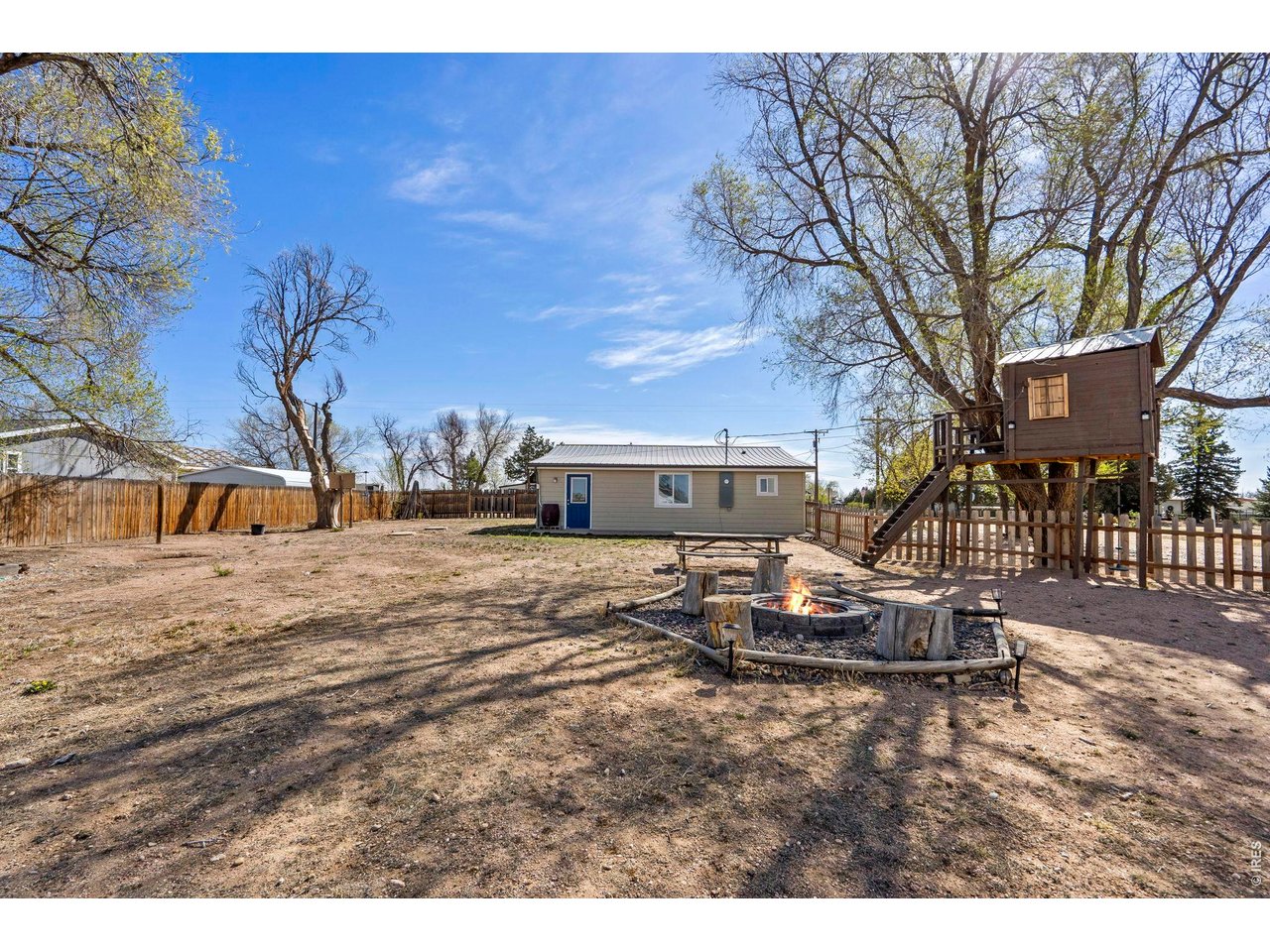 1083 2nd Street Nunn, CO 80648 - Photo 31 of 50 a view of a house with a yard