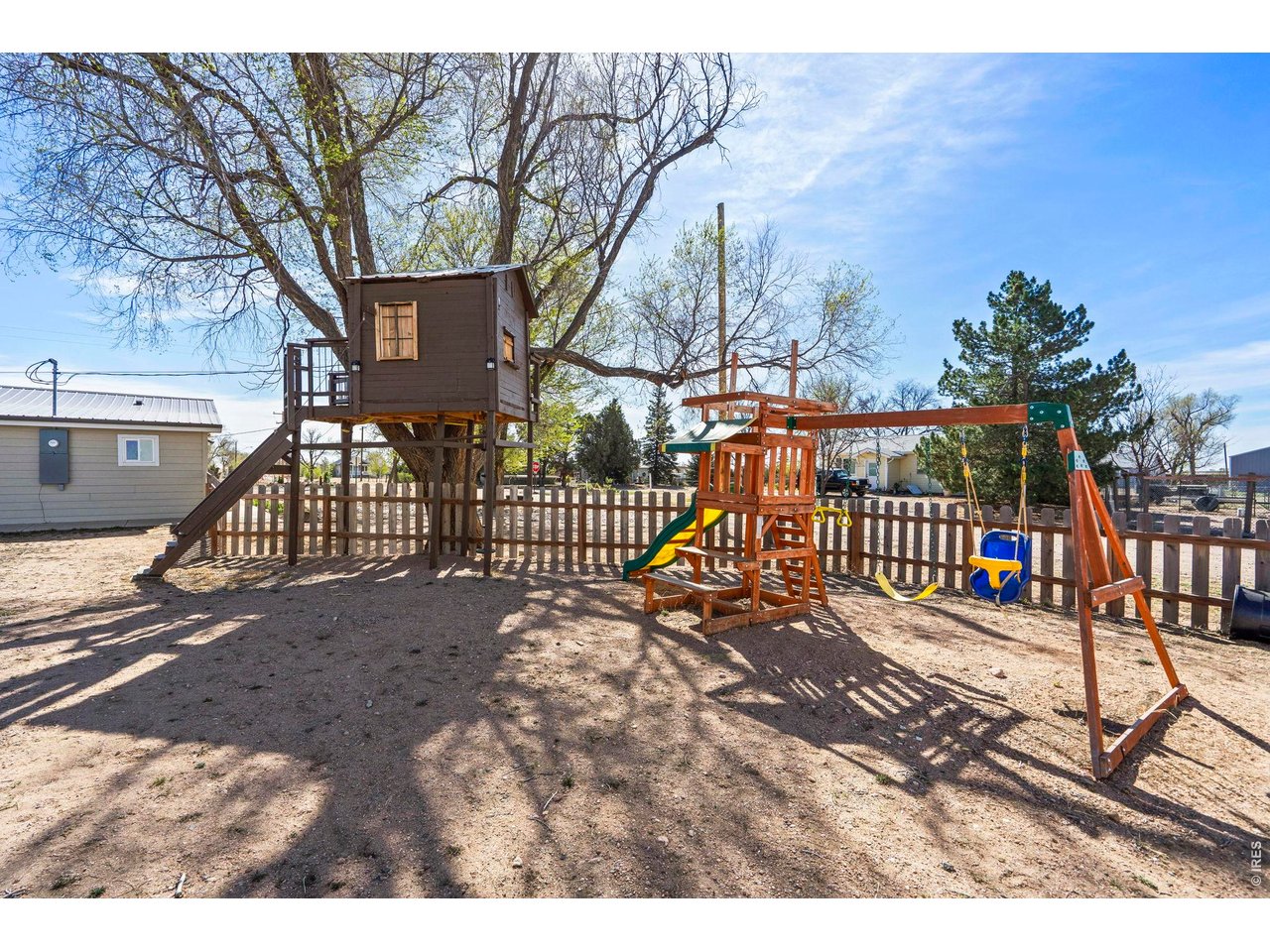 1083 2nd Street Nunn, CO 80648 - Photo 32 of 50 a view of a wrought iron fences in front of house