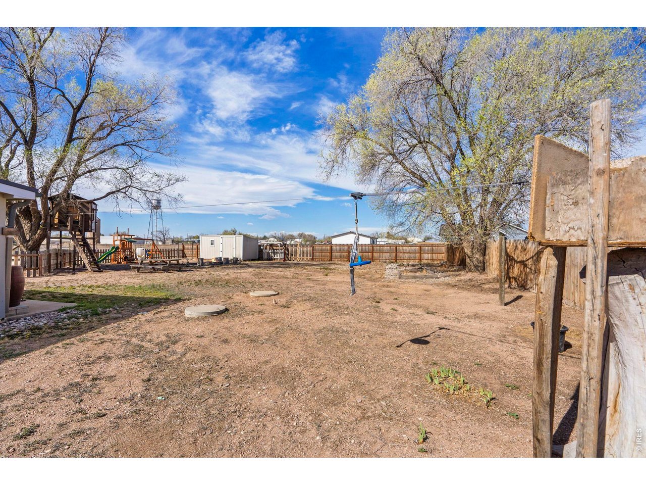 1083 2nd Street Nunn, CO 80648 - Photo 36 of 50 a view of road with large trees