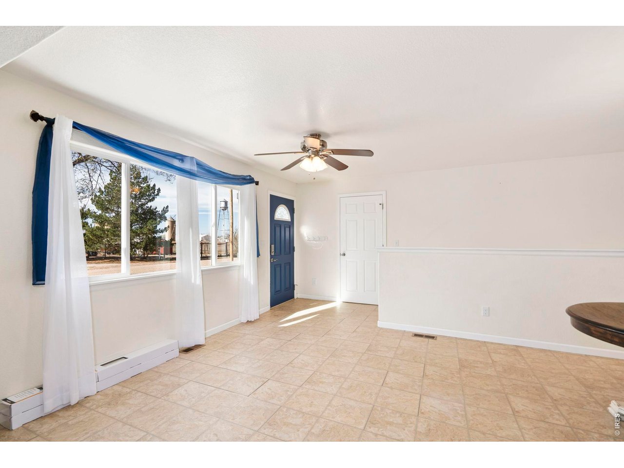 1083 2nd Street Nunn, CO 80648 - Photo 4 of 50 a view of a livingroom with a window