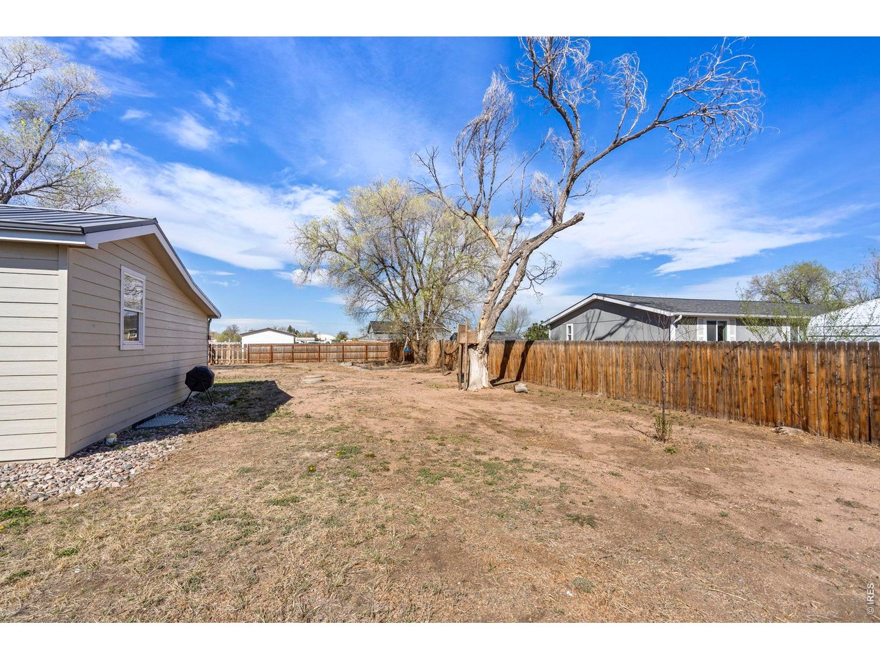 1083 2nd Street Nunn, CO 80648 - Photo 42 of 50 a view of a backyard of the house
