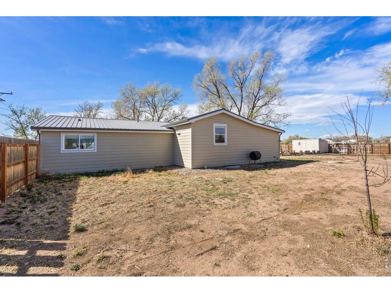 1083 2nd Street Nunn, CO 80648 - Photo 43 of 50 a view of a house with a snow