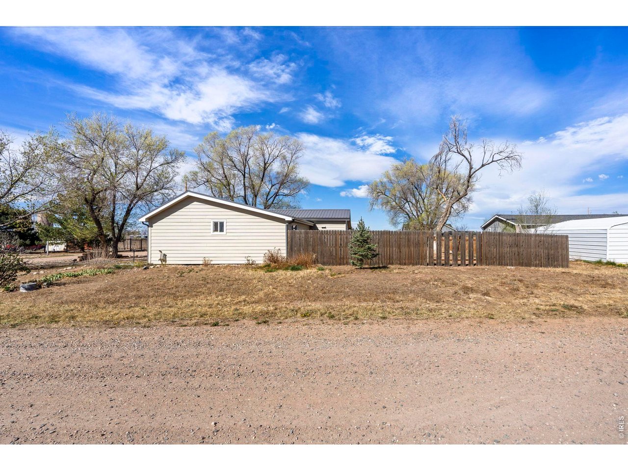 1083 2nd Street Nunn, CO 80648 - Photo 50 of 50 a view of dirt yard with a large tree