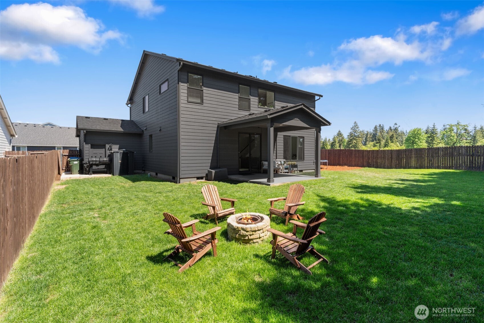 1090 Rw Fletcher Street Winlock, WA 98596 - Photo 32 of 40 a view of a patio with a yard
