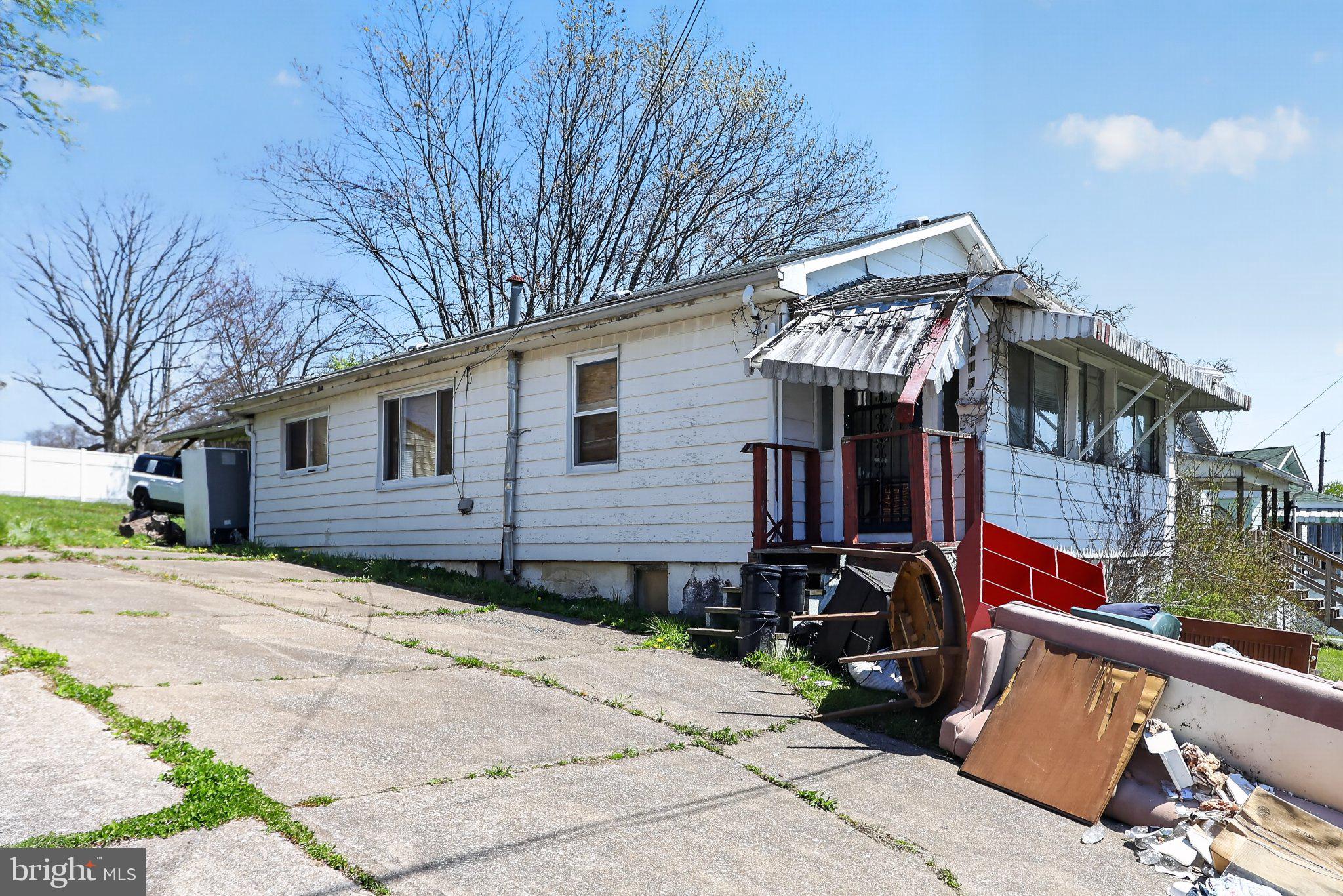 113 Cannaday Street Beckley, WV 25801 - Photo 1 of 14 a front view of a house with street