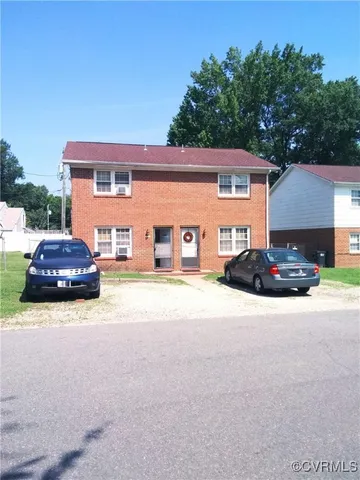 a car parked in front of a house