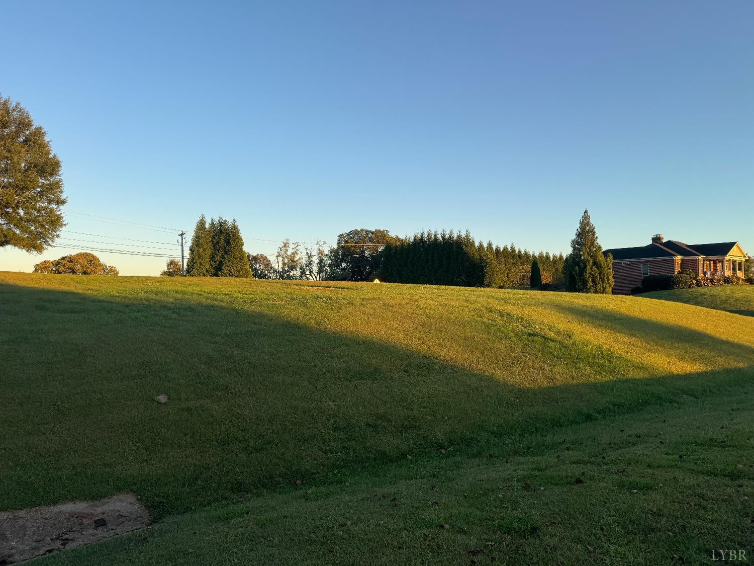 1 Nyle Ridge Road Wirtz, VA 24184 - Photo 8 of 9 a view of a golf course with a lake